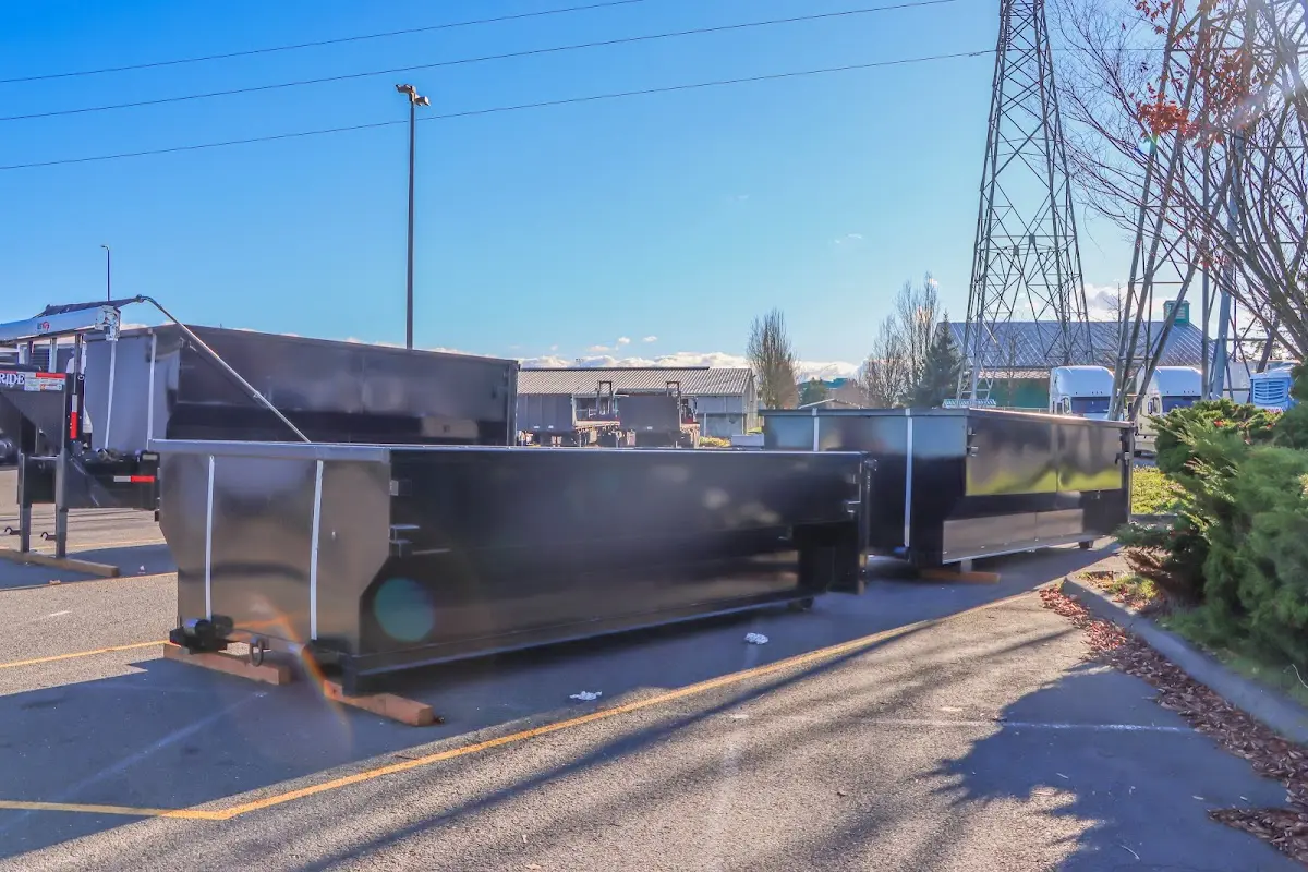 Roll-off dumpster ready for waste disposal at job site for 3 Yard Dumpster Rental in Johnston